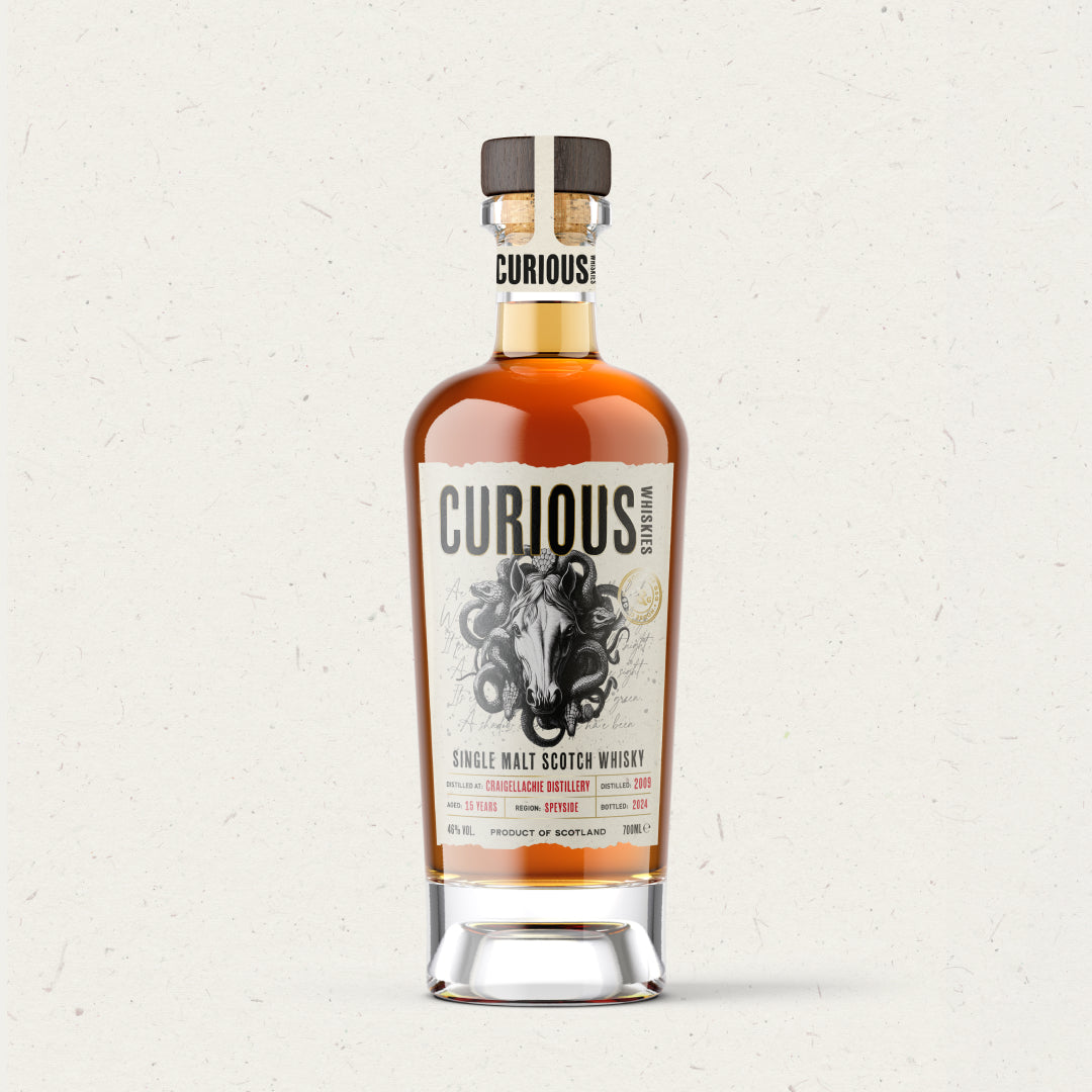 Bottle of Curious Single Malt Scotch Whisky on a light background