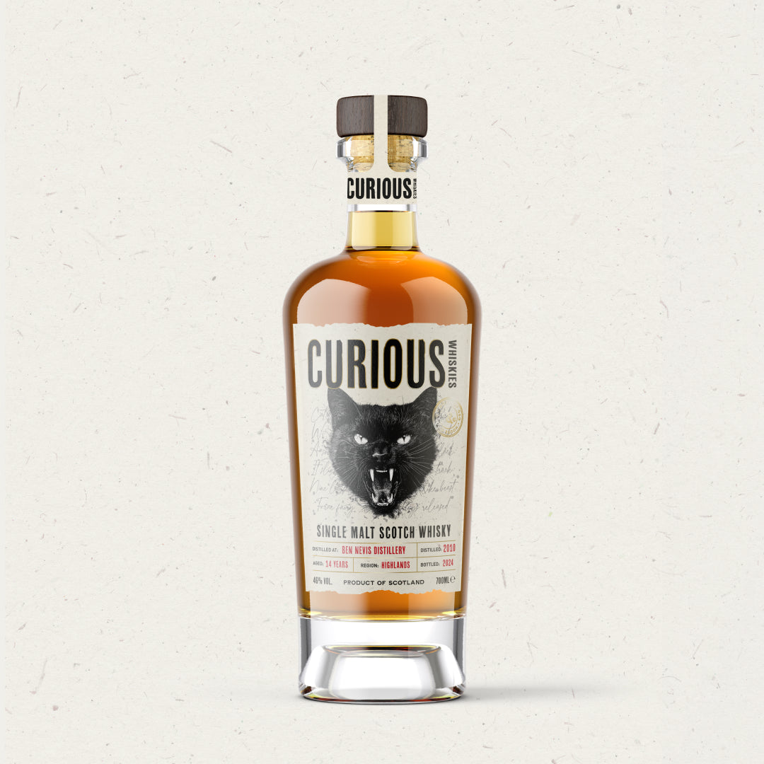 Bottle of Curious Single Malt Scotch Whisky on a light background